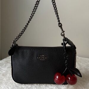 Coach Nolita 19 bag black leather and snake embossed leather with cherry charm
